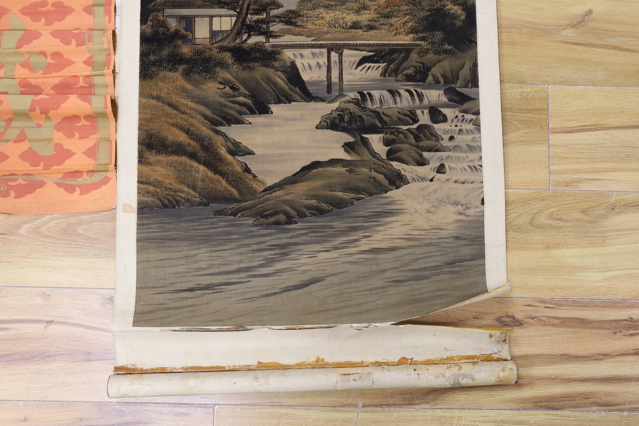 A Chinese calligraphic fabric hanging, 90 x 37cm, together with an early 20th century Japanese painted felt and watercolour landscape scroll
